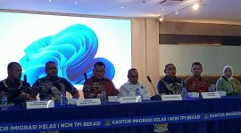Kepala Kantor Imigrasi Kelas I Non TPI Bekasi, UKI Aditya, dalam gelaran Laporan Refleksi Akhir Tahun 2024, di aula Kantor Imigrasi