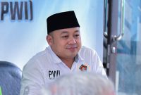 Ade Muksin, S.H