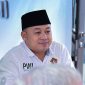 Ade Muksin, S.H